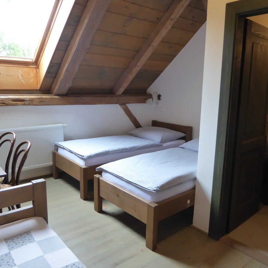 rustic village guesthouse converted from farm building, attic rooms, peaceful Czech countryside Semtěš